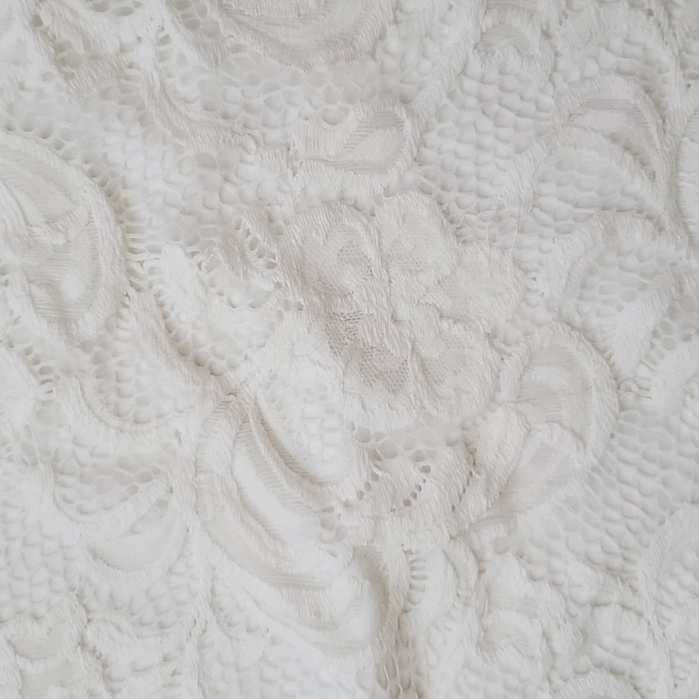 White lace mini skirt